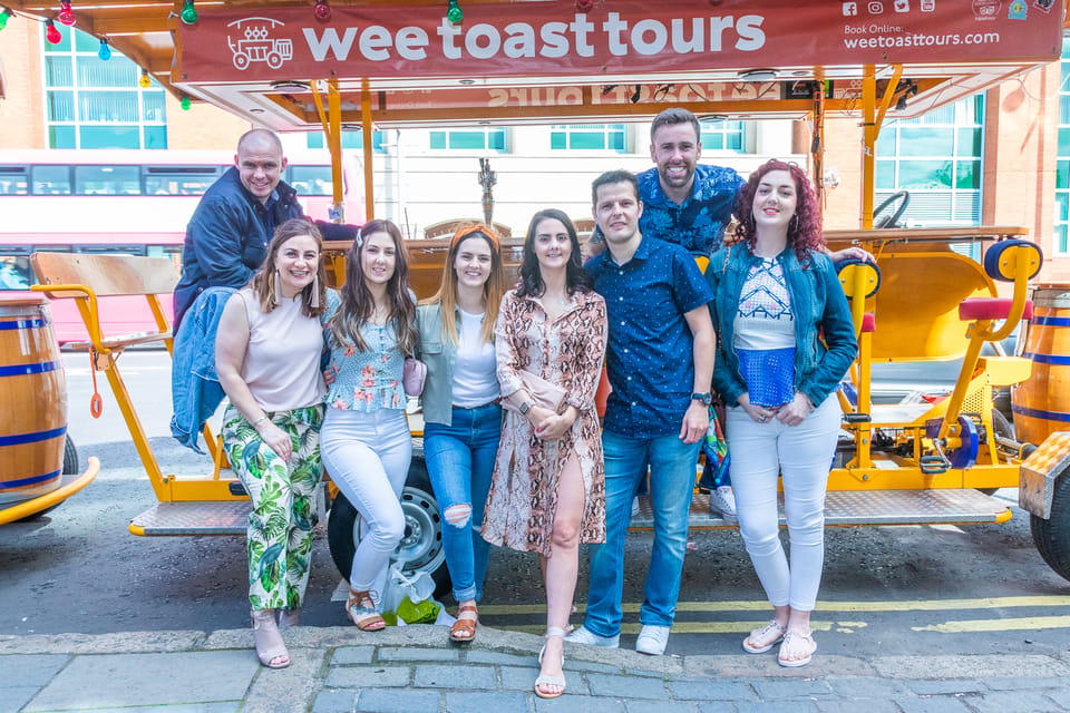 Belfast: City Centre Beer Bike Tour - Pedaling past Belfast City Hall and Royal Avenue