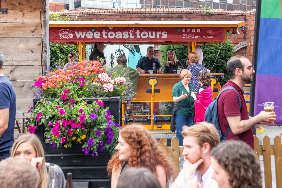 Belfast: City Centre Beer Bike Tour - Corn Market, the Opera House, and photo stops