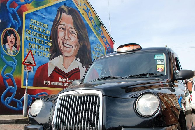 Belfast Famous Black Taxi Tour Political Murals & Peace Wall 2 Hr - Divis and the International Wall: starting with the conflict