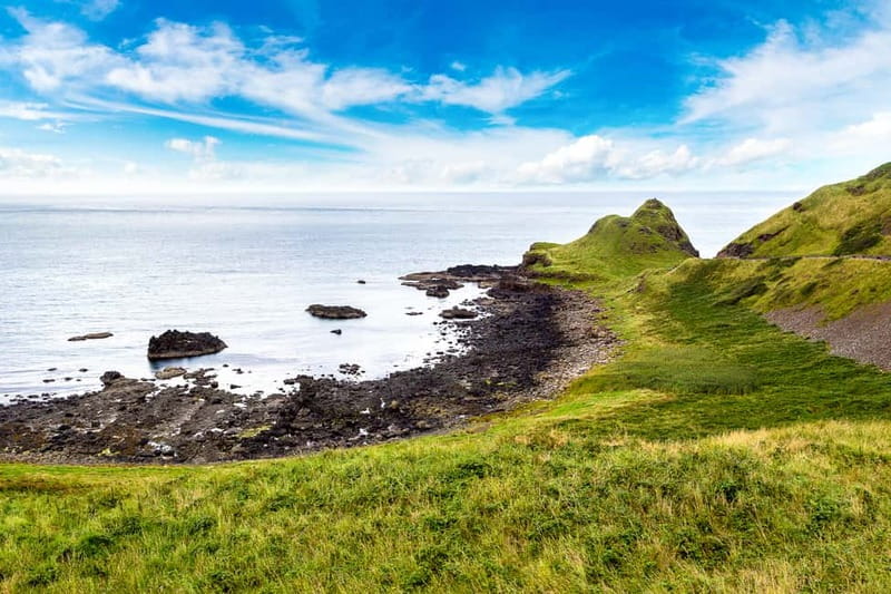 Belfast: Giant's Causeway, Coast Road & Game of Thrones Tour - Carrickfergus Castle opens the day