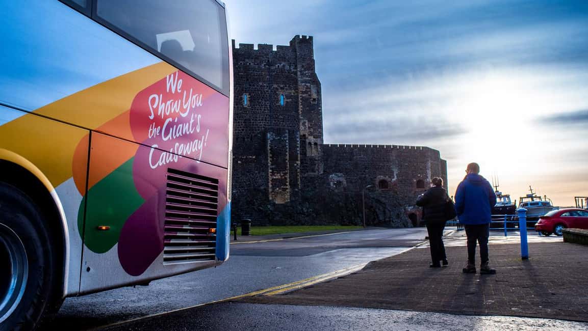 Belfast: Giant's Causeway & Irish Castles Tour -WIFI onboard - Carrickfergus Castle and the First Coastal Views