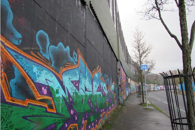Belfast: Murals Taxi Tour - The Peace Wall and a message in your own handwriting