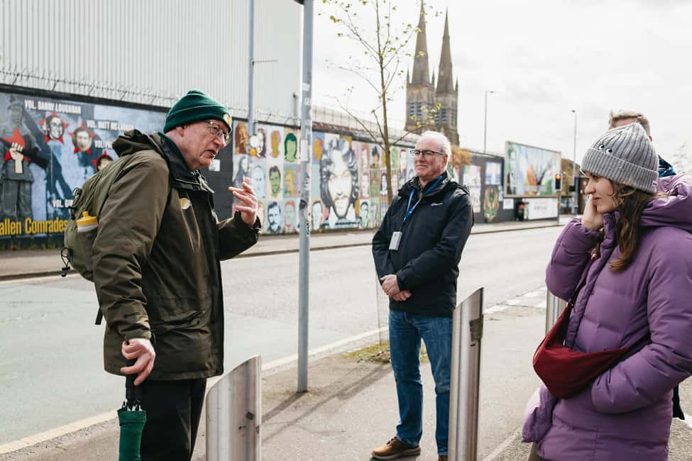 Belfast: The Troubles Walls & Bridges Guided Walking Tour - Divis Tower and the first mural