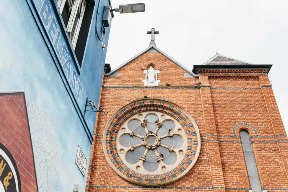 Belfast: The Troubles Walls & Bridges Guided Walking Tour - The International Wall and public memory