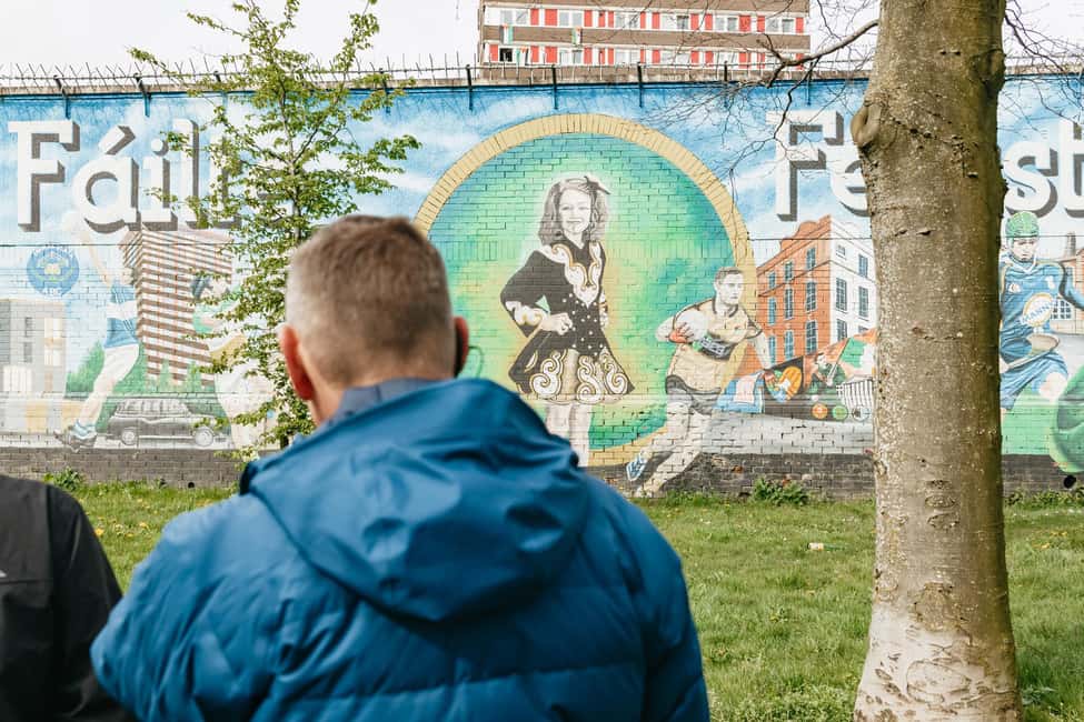 Belfast: The Troubles Walls & Bridges Guided Walking Tour - Belfast city center and the city moving forward