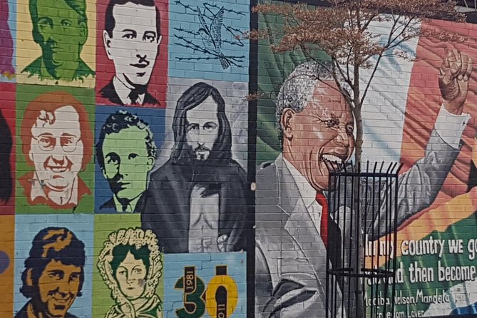 Belfast Troubles Murals Street Art and Peace Wall Walking Tour - The International Mural Wall on Divis Street