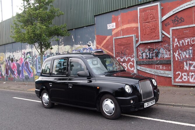 Black Taxi Mural "Tour Like A Local" - The Peace Wall and the city’s visible divide