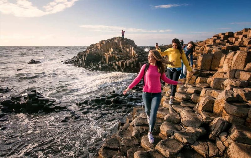 From Belfast: Giant's Causeway Guided Day Tour With Castles - Carrickfergus Castle and the first coastal views