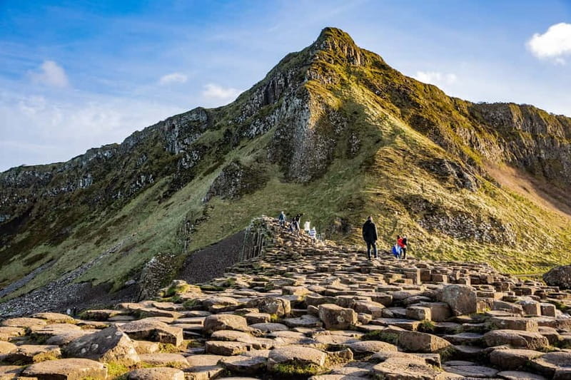 From Belfast: Giants Causeway Express Half-Day Tour - Dunluce Castle on the Atlantic cliffs