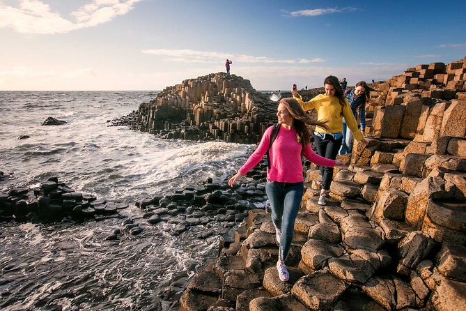 Game of Thrones Locations Tour including Westeros & Giant's Causeway - Dunluce Castle adds drama above the sea
