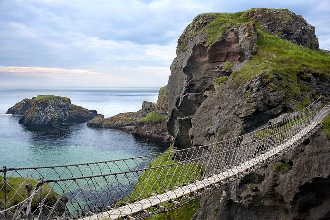 Guided Day Tour: Giant's Causeway from Belfast - Dunluce Castle from the roadside