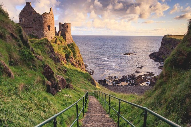 (Small Group) Shore Tour from Belfast: Giant's Causeway and Belfast Day Trip - Dunluce Castle and the edge of the sea